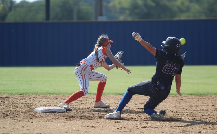 Bethel's Alexis Williams starts her slide into second as Maud's Janlee Impson waits for the catch at the Bethel home game on Aug. 12. The Lady Wildcats won by run rule, 12-0. Countywide & Sun/Natasha Dunagan