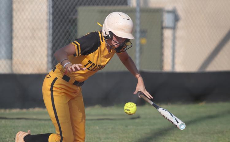 Tecumseh sophomore Madison Gray thows her bat down to run after a hit in the fourth inning of the Aug. 13 game with Cleveland. The Lady Savages won, 10-0. Countywide & Sun/Natasha Dunagan
