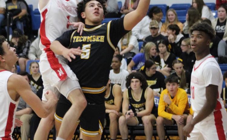Aveon Stokes plays against McLoud in the First United Tournament in December of last year. File photo