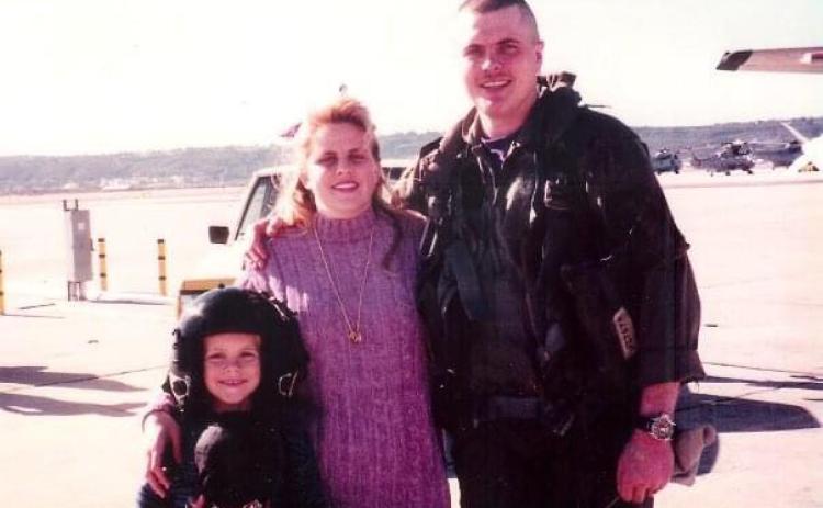 Tecumseh Assistant Police Chief Mike Mallinson poses with his wife, Laurie, and son, Michael Lawrence Mallinson, in 1994 at the Naval Air Station North Island in San Diego, after flying in from Hawaii after a six-month deployment aboard the USS Abraham Lincoln CVN72. Photo provided.