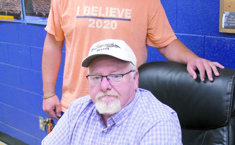 Ray Pell, seated, is bringing 20 years of experience teaching agriculture to Tecumseh's ag program. He joins his son, Corey Pell, who has been there for five years. Natasha Dunagan, Countywide & Sun