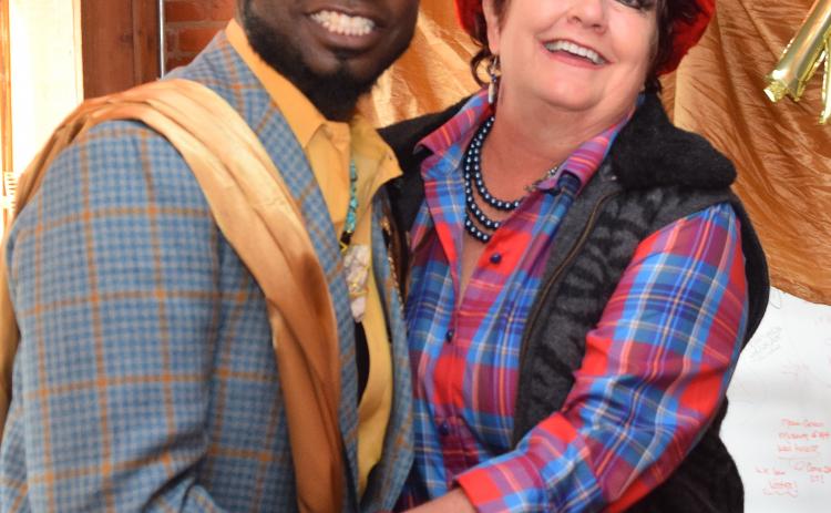 Emcee Jamelle Payne poses with Rags 2 Runway Event coordinator, Fran Topping.  Payne got the pleasure of being fashioned by Topping for the evening.  Topping was fashioned by co-planner, Dave Thomas.