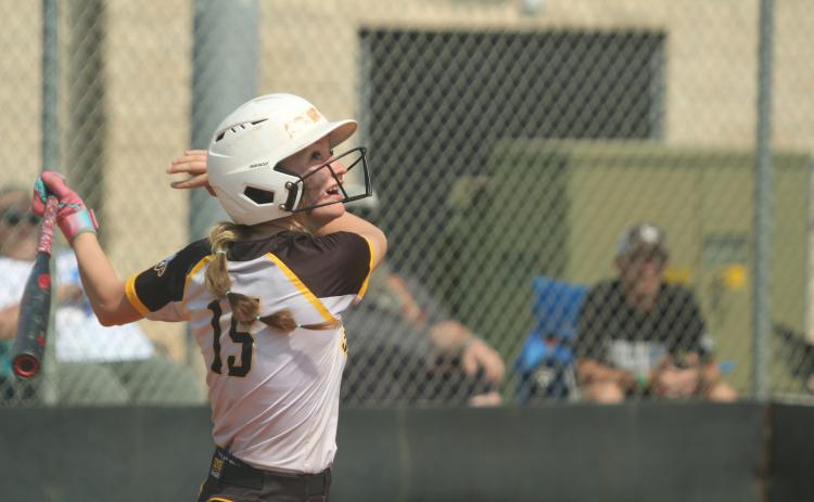 Tecumseh junior Jaylie Anderson gets a hit on Sept. 4. File photos by Natasha Dunagan, Countywide & Sun.