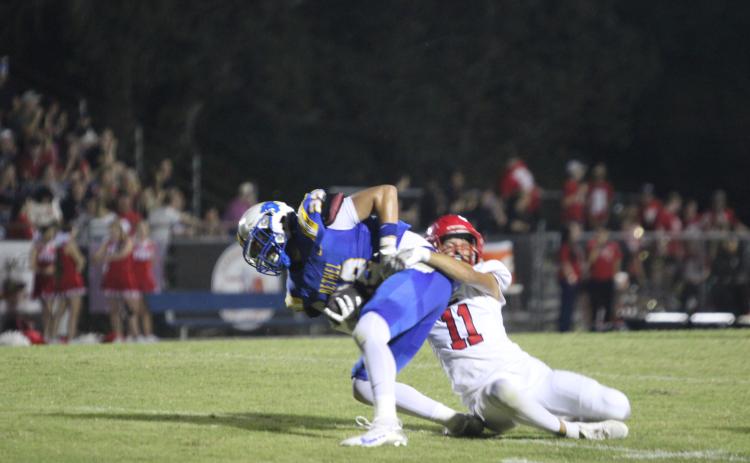 Bethel senior Zane Anderson tries to break free from a tackle during the home game against Prague on Sept. 26. The Wildcats won, 58-6. Natasha Dunagan, Countywide & Sun