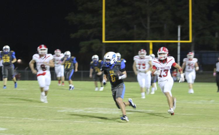 Bethel senior Leighton Swegheimer carries the ball for a first down and 10 during the Military Night home game against Kingston on Oct. 10. File photo