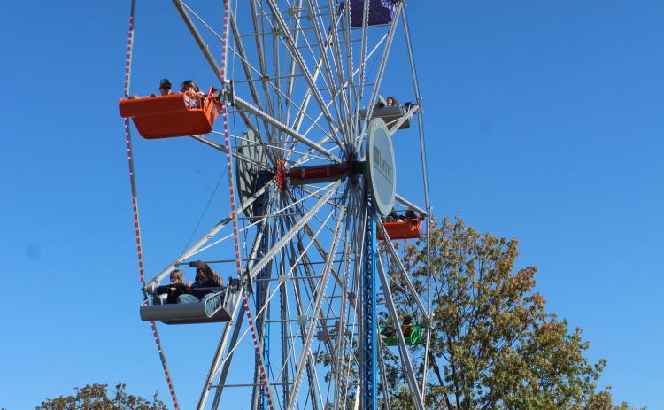 A ferris wheel was one of the attractions at the Shawnee Fall Fest at Woodland Veterans Park on Nov. 1. It was free to the public, as was the zipline, petting zoo, face painting, balloon creations and costume contests. The ferris wheel was rented from Ferris Wheel Rent in South Carolina courtesy of Pottawatomie County, Absentee Shawnee Tribe, Bison Federal Credit Union, Danfoss Power Solutions, Bison Metal Technologies and Citizen Potawatomi Nation. More than 1,400 people rode the ferris wheel.