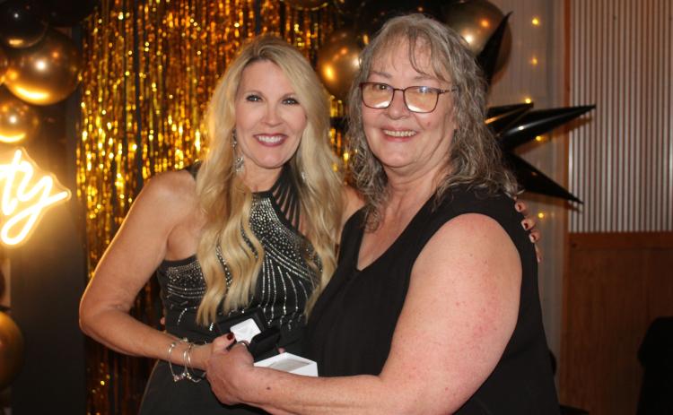Countywide & Sun Owner and Publisher Suzie Campbell, right, presents a Pottawatomie Power Poll Top 10 lapel pin to County Commissioner Melissa Dennis, who took the top spot during the Awards Gala on Oct. 24. Natasha Dunagan, Countywide & Sun