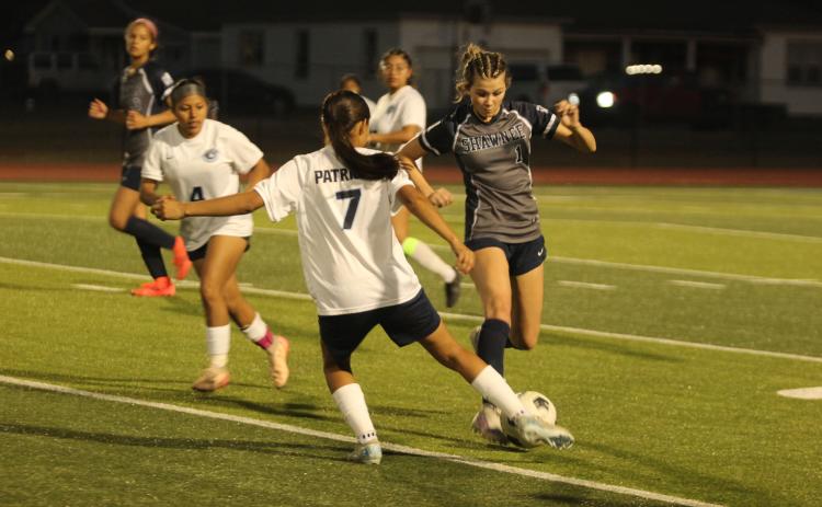 Shawnee's Khalli Sparks prepares to take control of the ball during the March 24 home game against Putnam City West. The Lady Wolves lost 0-6. Natasha Dunagan, Countywide & Sun