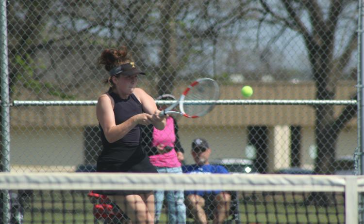 On #2 Singles, Kylie Britt keeps the ball in play during the Tecumseh Tennis Tournament on March 30. Britt placed fifth in the tournament. Photos by Natasha Dunagan, Countywide & Sun