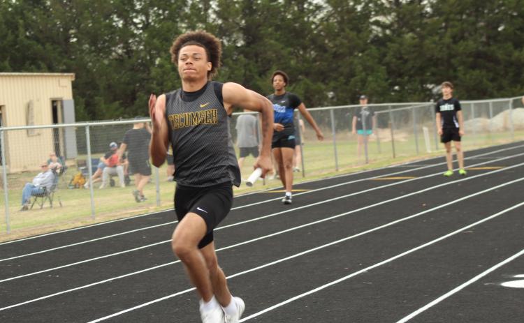 Tecumseh senior Jekhi Owens runs in one of the three relay races he competed in during the Tecumseh Track Meet on March 31. Track Coach Kourtney Ozment said in an email that they hosted seven schools, with students in seventh- and eighth-grades and high school, and Owens' relay team placed second in the 4x400 that day. Photos by Natasha Dunagan, Countywide & Sun. Click on the camera banner ad below to see all the photos from the meet!