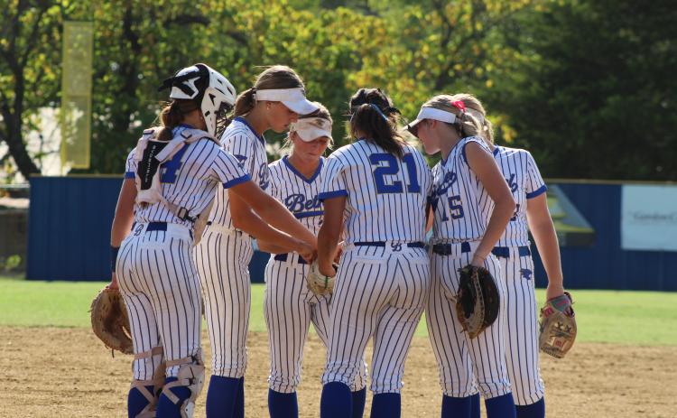 The Bethel Lady Wildcats infield players huddle before the second inning of the Aug. 17 home game against Prague. Photos by Natasha Dunagan, Countywide & Sun
