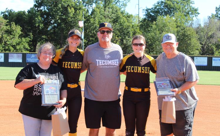 Photographer Kenetta Lisenbee, far left, and Countywide & Sun Reporter Danny Chambers, far right, were honored with plaques of appreciation before the Sept. 14 Tecumseh High School fast pitch home game. See full caption below.