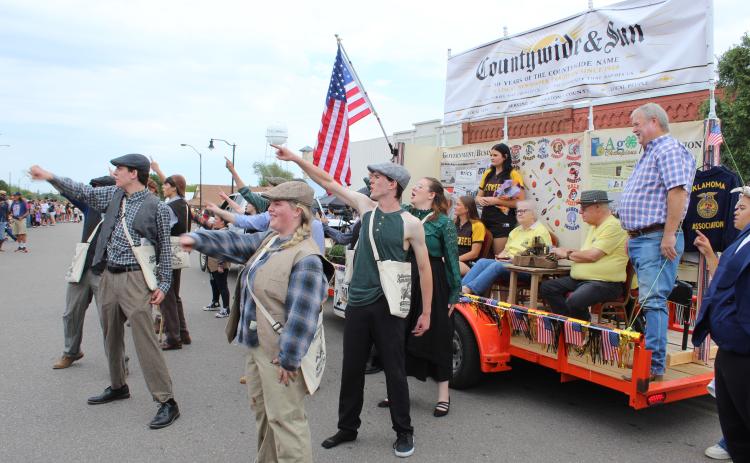 The North Rock Creek drama "Newsies" perform "The World Will Know" from their spring play for the Frontier Days Parade judges, as part of the Countywide & Sun's 50th anniversary float. Natasha Dunagan, Countywide & Sun