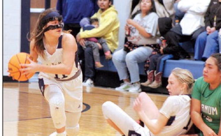 Asher’s Cadence Leba recovers the ball and looks to pass in the home game with Varnum on Jan. 2. Countywide & Sun/Natasha Dunagan