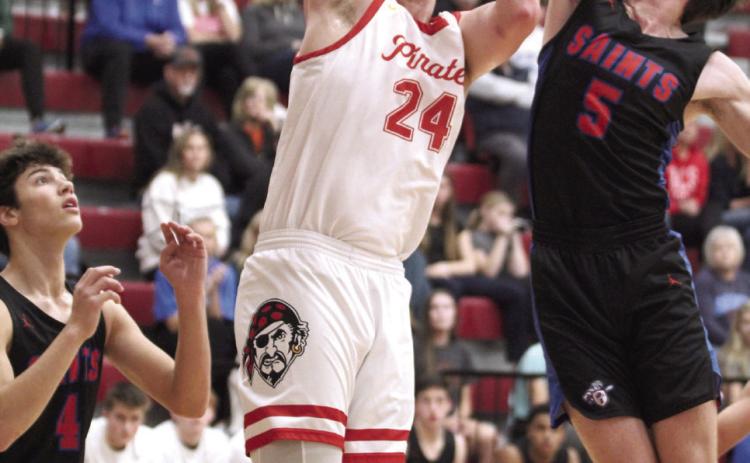 Dale senior Trayden Chambers sinks his shot at the end of the first quarter.