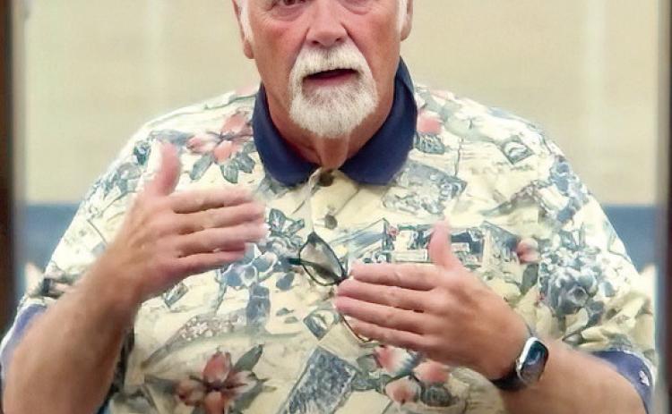 Dr. Wendle Richards spoke to the board about the biohazard smell affecting the 45 acres on Hazel Dell Rd. that he owns and lives on. Photo Provided