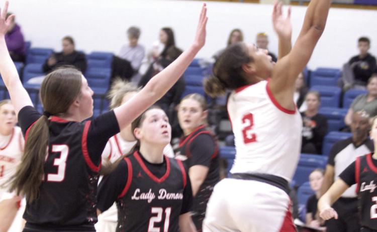 McLoud's Claire Mapira puts up a shot during the game against Perkins-Tryon in the Bethel First United Basketball Classic on Dec. 11. The Lady Redskins won that game, 70-25; beat Blanchard, 64-36; and bested Bethel, 63-41, to take first in the three-day tournament. According to a McLoud Athletics Facebook post, Mapira was named MVP of the tournament and to the All-Tournament Team. Natasha Dunagan, Countywide &amp; Sun