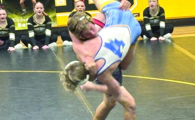 Xzavier Kommer upends his opponent at Tecumseh's home dual on Red Ryder Night, Dec. 4. Kommer won this match. The Savages won their dual 45-24.