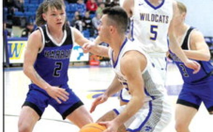 Bethel senior Bray Bussell looks for an opening during the Jan. 9 Harrah game. Bussell recently joined the 1,000-point club. File photo.