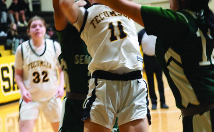 Tecumseh’s Kenzli Warden tries for a basket and is fouled in the home game against Seminole on Jan. 28. The Lady Savages won, 70-27. Photo provided by Kenetta Kay Lisenbee.