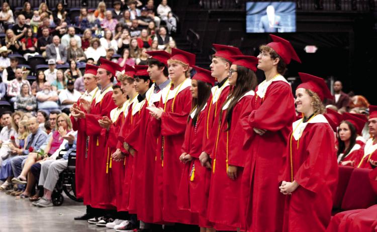 The Dale High School Valedictorians - Andrew Collins, Aidan Taylor, Kamren Wilson, Easton Howe, Gael Ramirez, Ford Hampton, Denton Forsythe, Kaylyn Solis, Zairek Chavez, Audrina 'Boo' Herber, Paul Potts and Aimee Rogers - are recognized during graduation on May 21 at FireLake Arena. Collins and Taylor addressed their class. Photos by Natasha Dunagan, Countywide & Sun