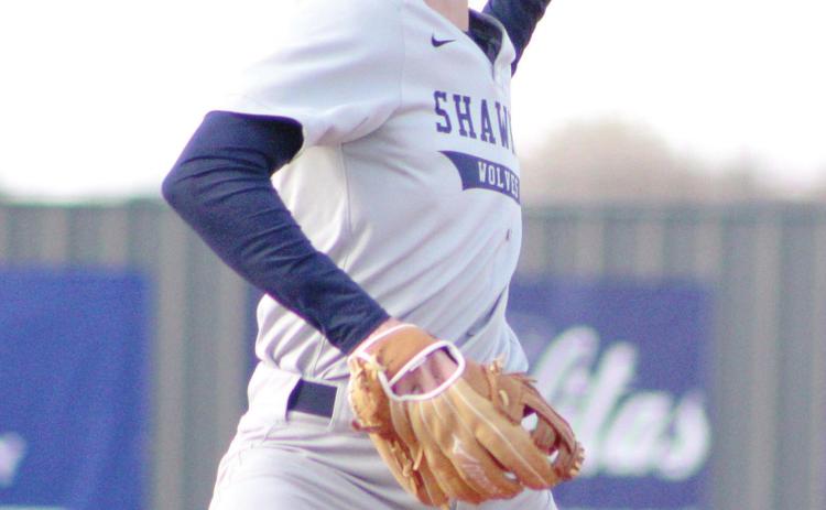 Shawnee junior Preston Tully winds up a pitch in the home game against Bishop McGuinness during the Bill Tipton Classic on April 7. Shawnee lost that game, 8-10, but they came back on April 8 to win against Del City, 15-4. Countywide &amp; Sun/Natasha Dunagan