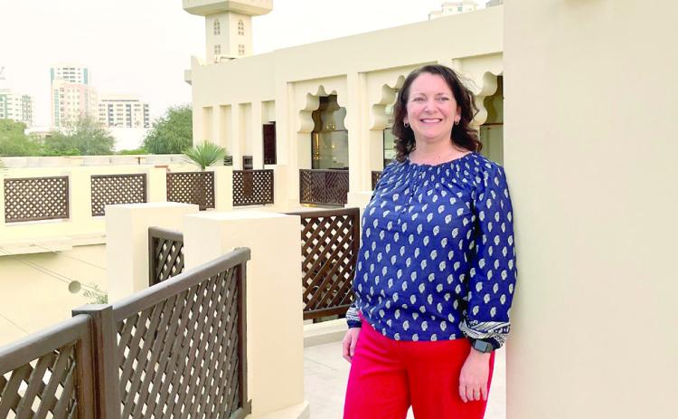 Shawnee Public Schools Director of Library Services and Middle School Librarian Cherity Pennington pauses for a photo in the United Arab Emirates. Pennington was invited to speak at the first ALA Sharjah School Librarians Conference in April. Photo courtesy of Cherity Pennington