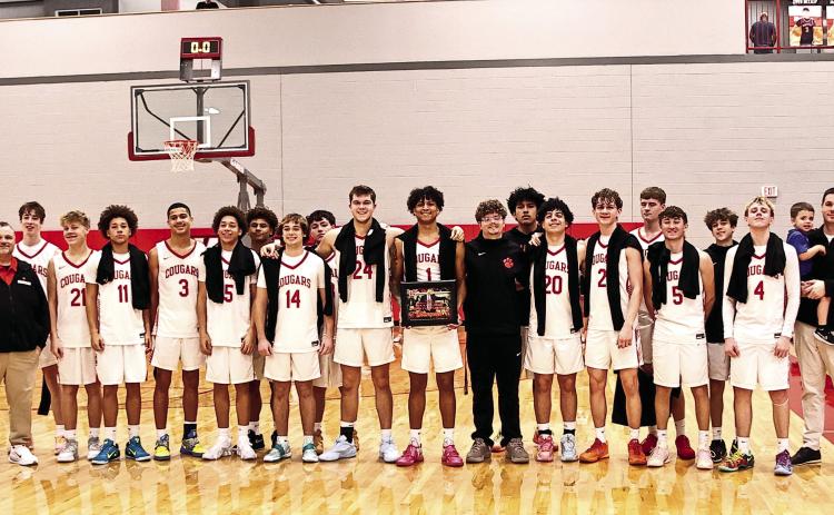 NRC's boys basketball team traveled to the Washington Tournament on Feb. 9. The finals were scheduled for Jan. 22nd, but was postponed due to snow storms. They took on Broken Bow, beating them 65-54. NRC won the tournament for the fourth year in a row. Photos Courtesy of Gowin Photography