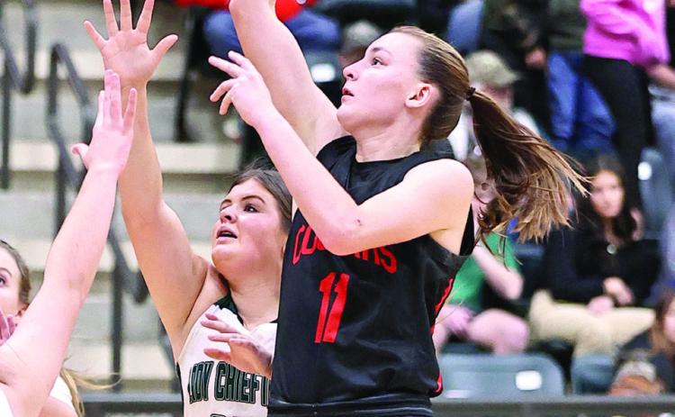 Pictured above, North Rock Creek’s Lydia VanAntwerp makes the bucket.