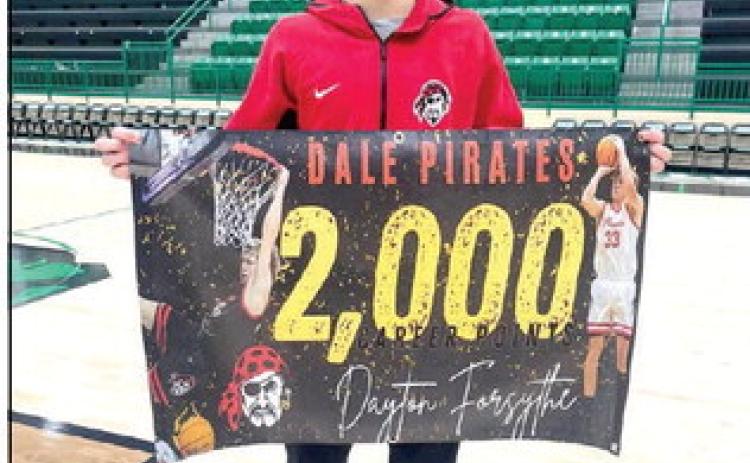 Pictured right, Dale senior Dayton Forsythe reached 2,000 career points during the Jan. 2 game at Jones and is the all-time leading scorer for the Pirates. Photo provided.