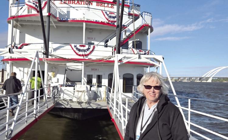 Arthenia Haney of Tecumseh stands on the deck of the Mississippi paddle boat 'Liberation Belle' earlier this month. Photo provided