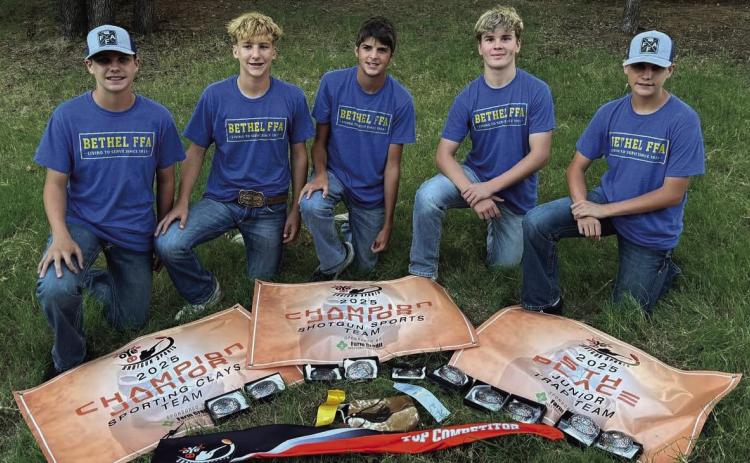 The Bethel Junior Shooting Sports Team - Cayden Roberts, Barrett Nunneley, Blaze Tarbox, Landon Boles and Jaxon Roberts - poses with their banners and belt buckles after winning Champion Junior Sporting Clays Team, Champion Junior Shotgun Sports Team and fifth place in Junior Trap Team at the Oklahoma Youth Expo last month. Photo courtesy of Dr. Brett Scott