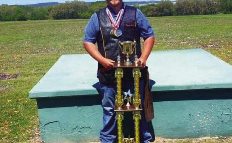 Tecumseh Graduate Is Twice National Champion On College Shooting Team - Shown here with ACUI trophy