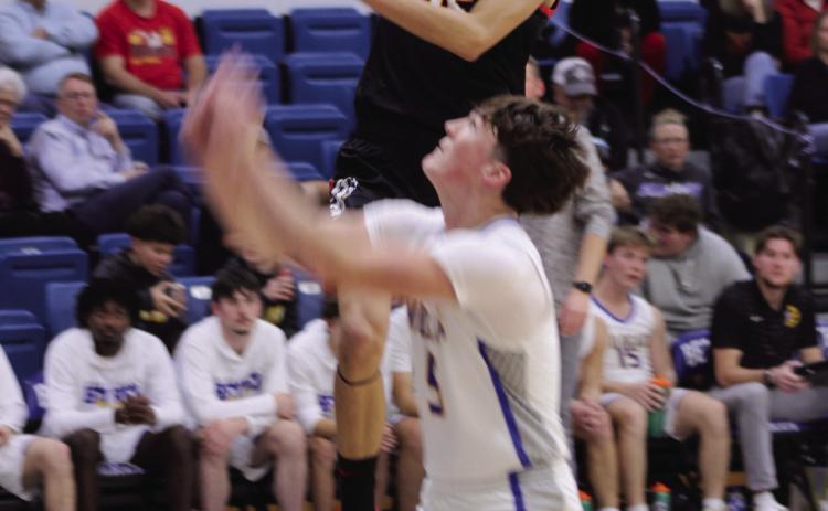 Dale junior Keiton Hill tries for two points, as Bethel senior Zack Jennings prepares to catch the rebound, during the second quarter of the Jan. 20 Wildcats home game. The Pirates won 92-34. Natasha Dunagan, Countywide &amp; Sun