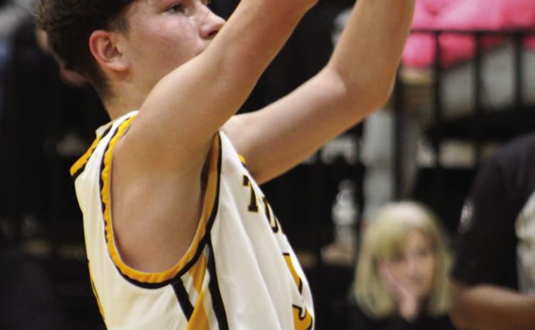 Tecumseh’s Jason Baldwin shoots two free throws during the last couple minutes of the home game with North Rock Creek on Jan. 3. The Savages lost, 52-80, and the Lady Savages won their game, 52-49. Countywide &amp; Sun/Natasha Dunagan