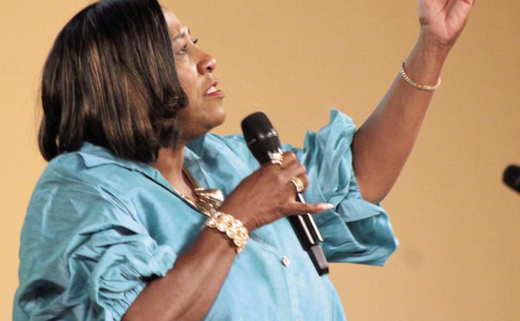 Anise Young sings “Goodness of God” by CeCe Winans at the Juneteenth Reception, held at the Grand Casino Hotel and Resort on June 21. Other musical entertainment at the event included the Alpha Phi Alpha and Beta Eta Lambda Stomp Show, Cletis Lowe, and the trio of Barbara Cooks, Galian Murphy and Willie Huffman. File photo