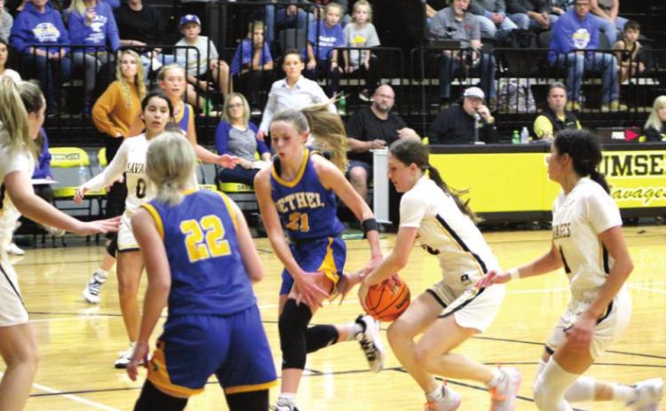 Tecumseh’s Kenzli Warden steals the ball from Bethel’s Josie Megehee (#21) during the Tecumseh home game on Dec. 3. Bethel won 71-57. Countywide &amp; Sun/Natasha Dunagan