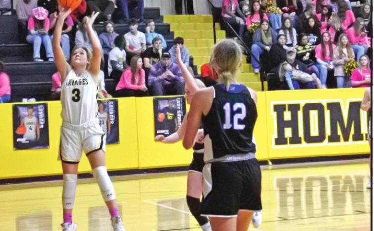 Tecumseh’s Sadie Boatman lines up her shot during the homecoming game against Little Axe on Jan. 28. The Lady Savages won 63-26. Countywide &amp; Sun/ Suzie Campbell