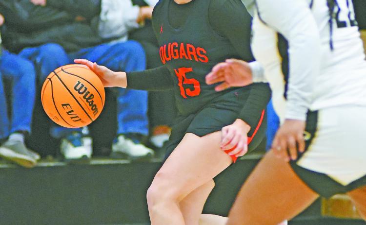 Morgan Campbell brings the ball up court for North Rock Creek during the finals of the Okemah Tournament Saturday evening. Photos courtesy of Brian Blansett, Lincoln County News