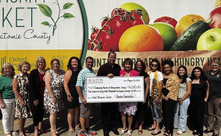 Board Members &amp; Staff from Community Market and Avedis Foundation are pictured together with Jill Spencer, Board Chair Avedis Foundation, Daniel Matthews, Executive Director CMPC, and Dr. Kathy Laster, President &amp; CEO Avedis Foundation. Photo Provided.