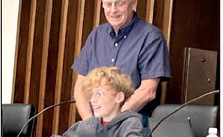 Dale 7th grade student Eli Smith calls the Shawnee City Commission meeting to order Monday, Sept. 18. Countywide &amp; Sun/Suzie Campbell