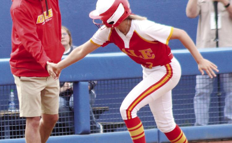 After hitting a home run, Dale senior Chayse Caram gets five from Coach Andy Powell as she rounds third base in the first inning of the Class 3A State Tournament Finals against Caddo on May 3. Countywide & Sun/Natasha Dunagan