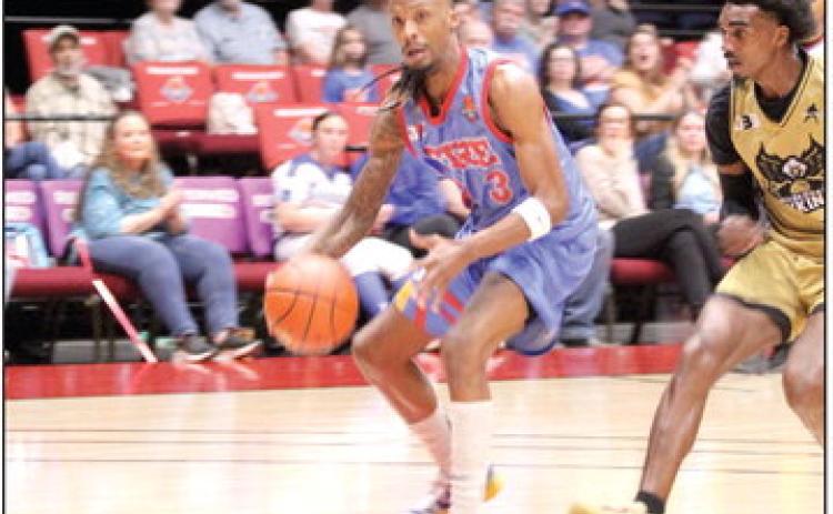 Potawatomi Fire Forward Ricky Artis II drives to the hoop. Photos by Natasha Dunagan, Countywide & Sun