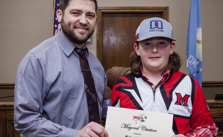 McLoud Mayor Daniel McClure presents Mayoral Citation to McLoud High School Student Eric Brown. Photo courtesy of Monica Poindexter
