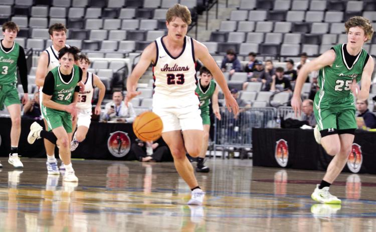 Asher's Andrew Overstreet takes it up-court before adding two points in the first quarter of the Class B2 State Quarterfinal game against Leedey on March 3 at the OG&E Coliseum in OKC. The Indians lost, 42-52, and they end their season with a record of 24-7. Click on the camera banner ad below to see all the photos. Photos by Natasha Dunagan, Countywide & Sun