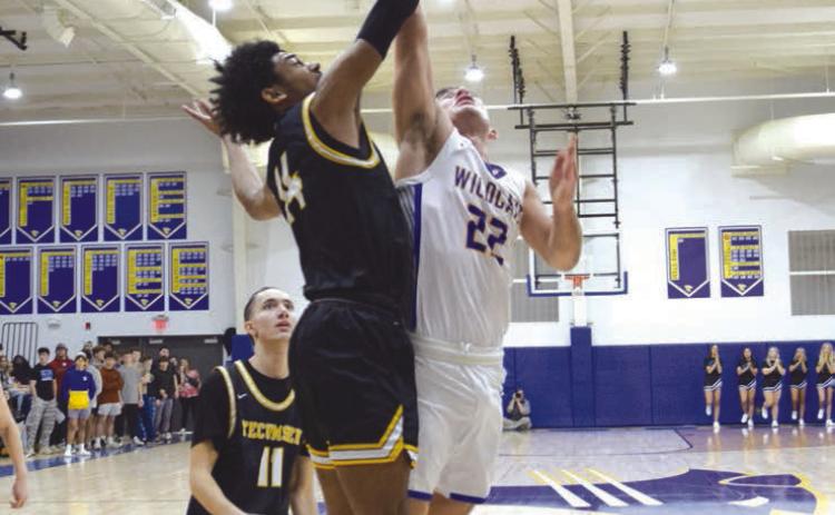 Tecumseh’s Jace Edwards and Bethel’s Bray Bussell fought to the finish in the double overtime matchup on Feb. 2nd. The Savages took home the win 64-60. Countywide &amp; Sun/Julie Talton