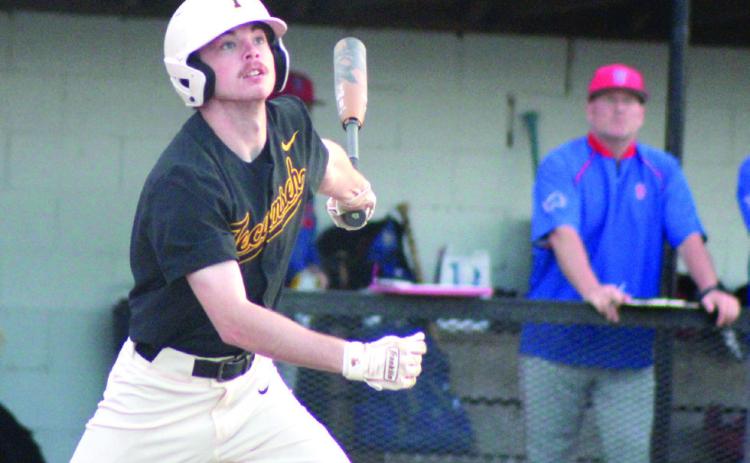 Tecumseh senior Malachi Boyce watches the ball before running to first during the home game with Chandler on March 7. The Savages lost, 6-11. Countywide &amp; Sun/Natasha Dunagan