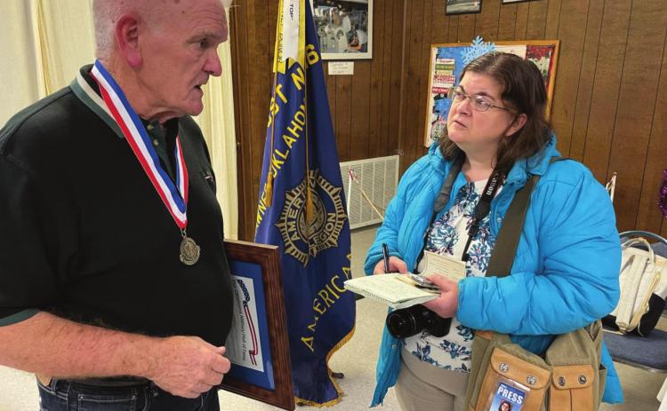 Natasha Dunagan interviews Skip Myers, for her feature article about his father TSgt. Verdun C. Myers’s induction into the Oklahoma Military Hall of Fame. Photo Provided.