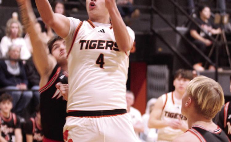 Maud sophomore Trenton Marshall aims for the basket and draws a foul during the Feb. 5 home game against Wayne.