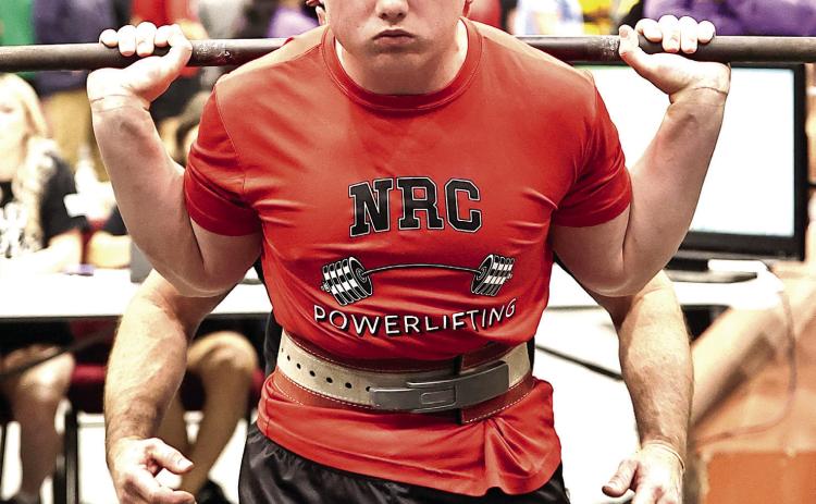 NRC's Wrigley Rendleman squats 495 pounds, finishing in second place. Photo Provided by Gowin Photography